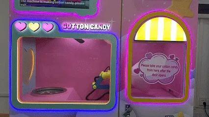 Cotton Candy Vending Machine Operating Instructions - Take out the cotton candy and enjoy the delicious taste